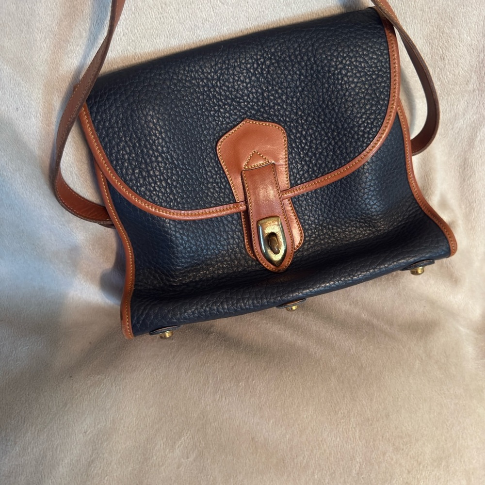 Classic Dooney & Bourke Pebbled Leather Shoulder Bag in navy and Tan